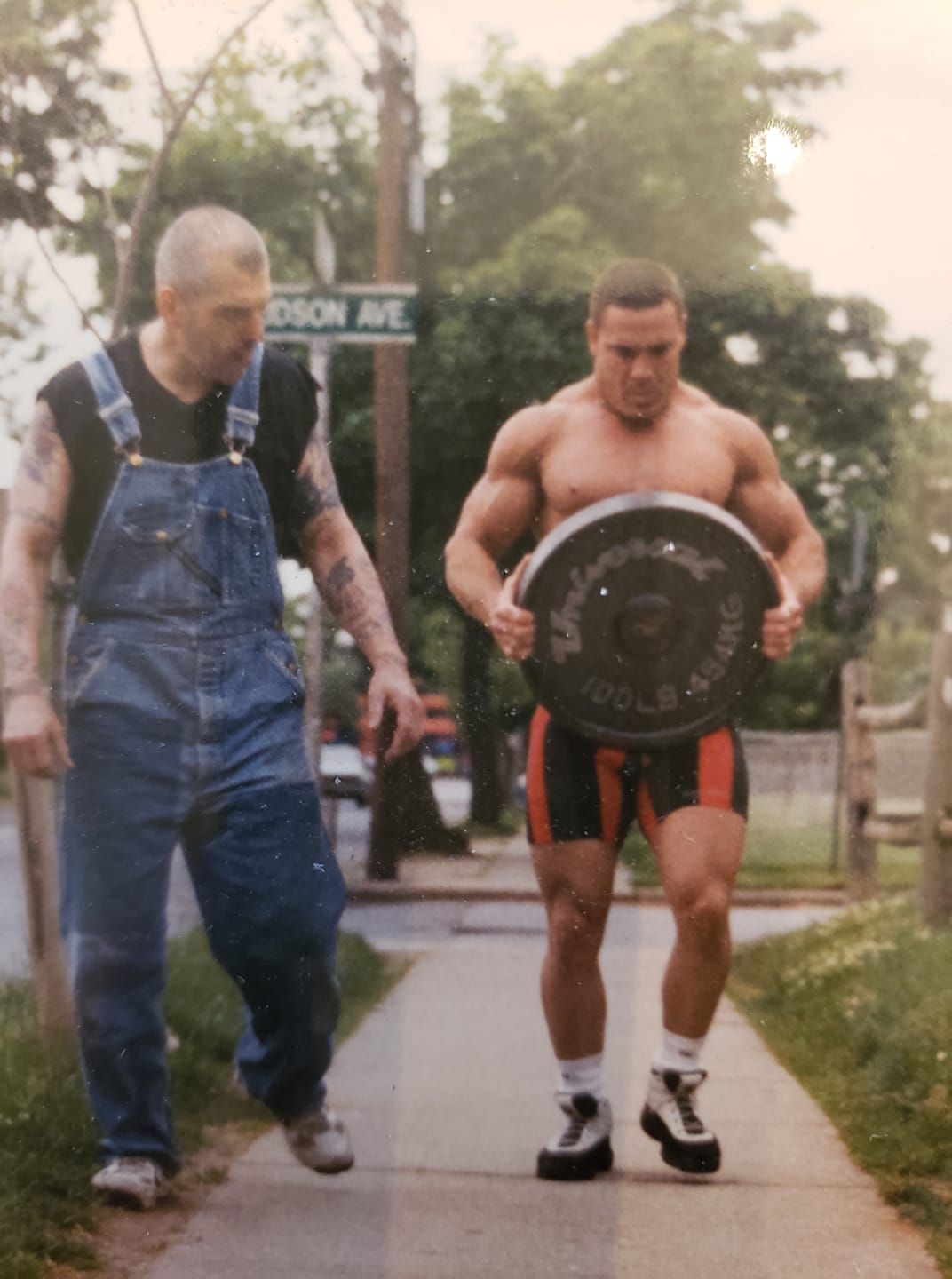Archival photograph of an outdoor plate carry with Dr. Ken