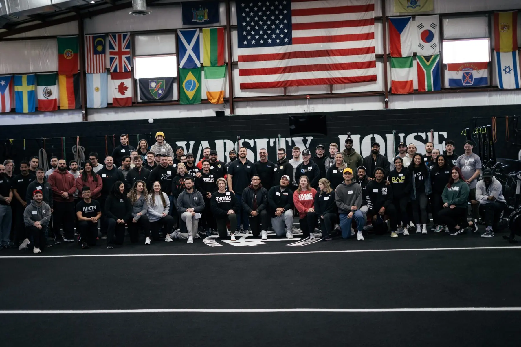 Lifters and coaches gathered in the gym at Underground Strength Con